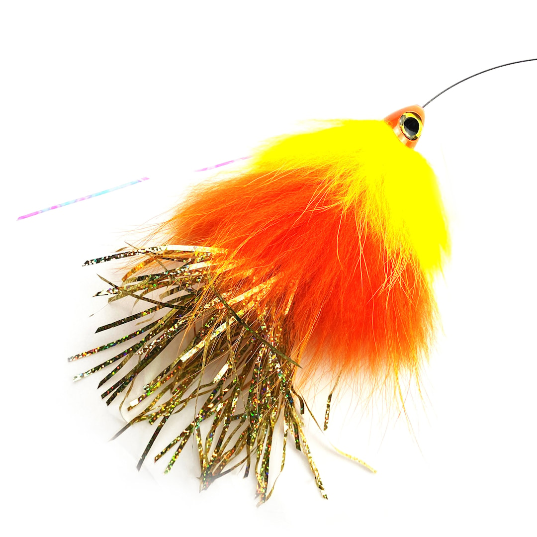 Läs mer om Spintube Pike 45 g kastfluga gul/orange/hologuld tinsel